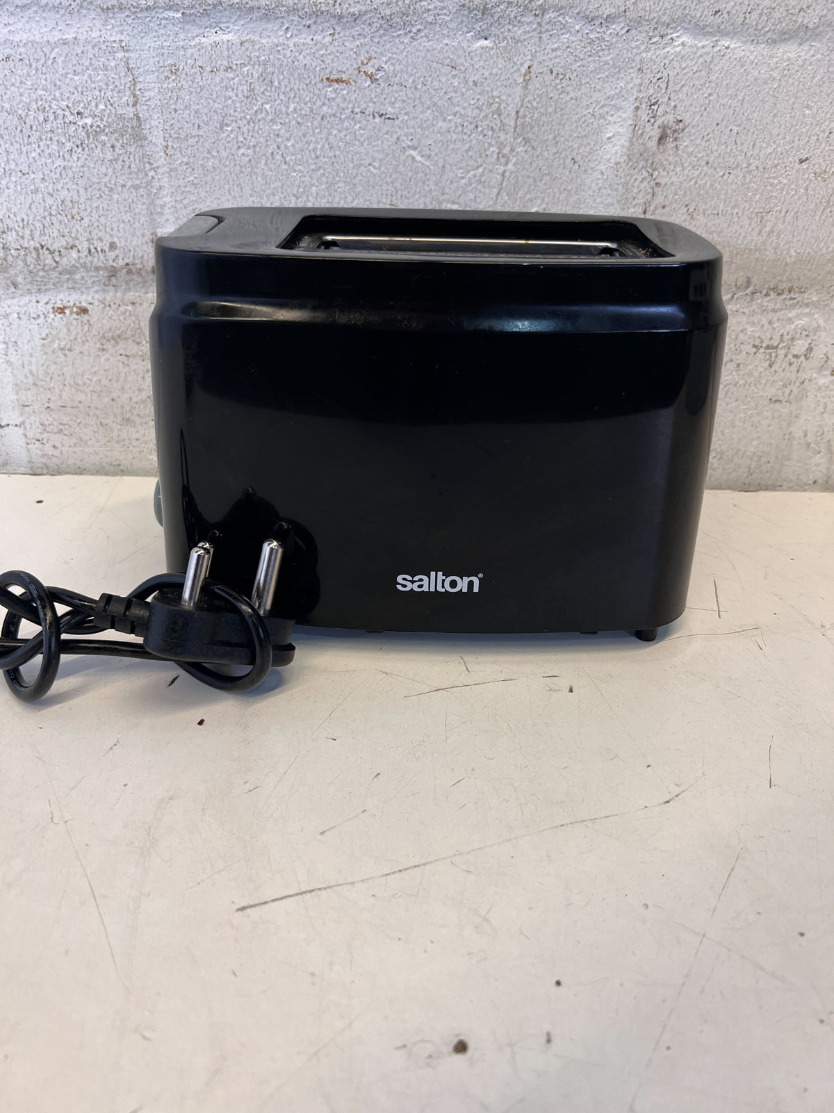 Compact Black Salton Toaster with Minor Scratches
