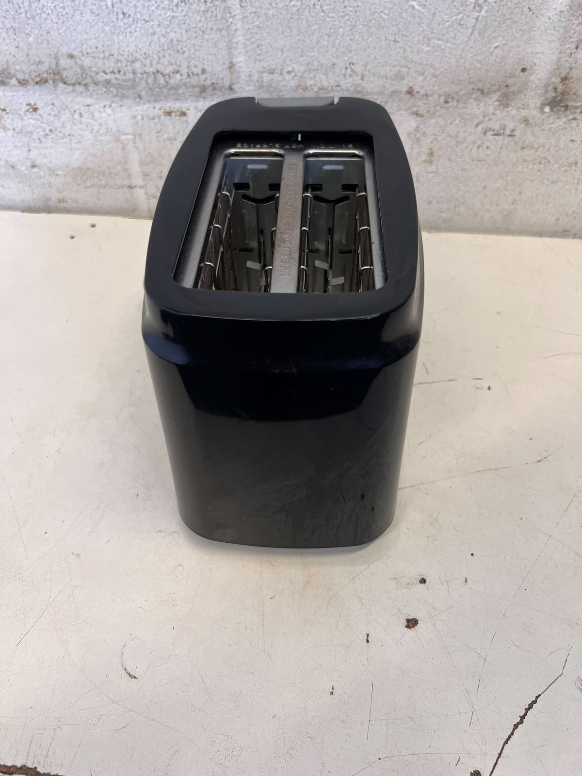 Compact Black Salton Toaster with Minor Scratches