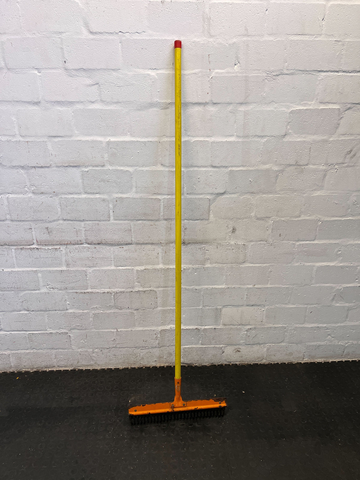 Durable Yellow and Orange Push Broom with Minor Wear - 2ndhandwarehouse.com
