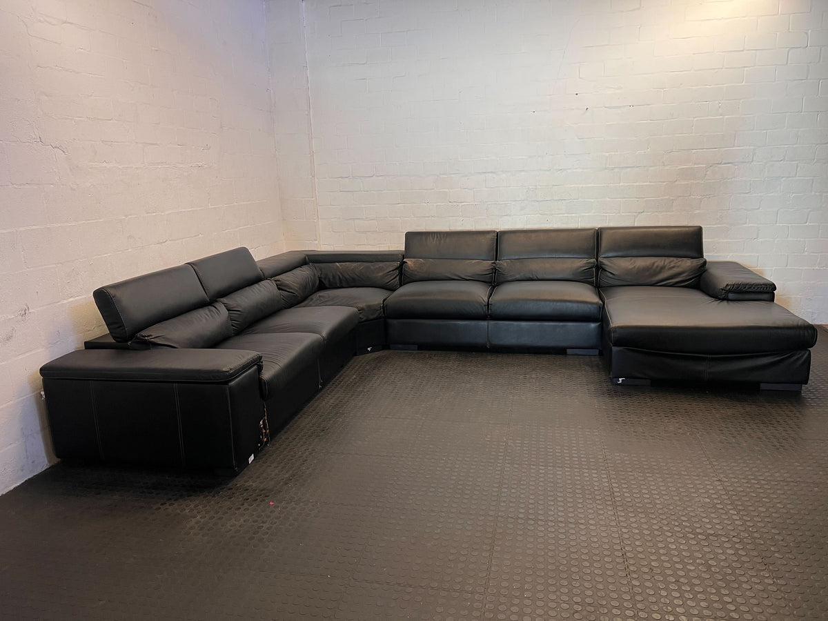 L shape lounge suite  - Spacious Black Leather Sectional Sofa - Some visible damages - 2ndhandwarehouse.com