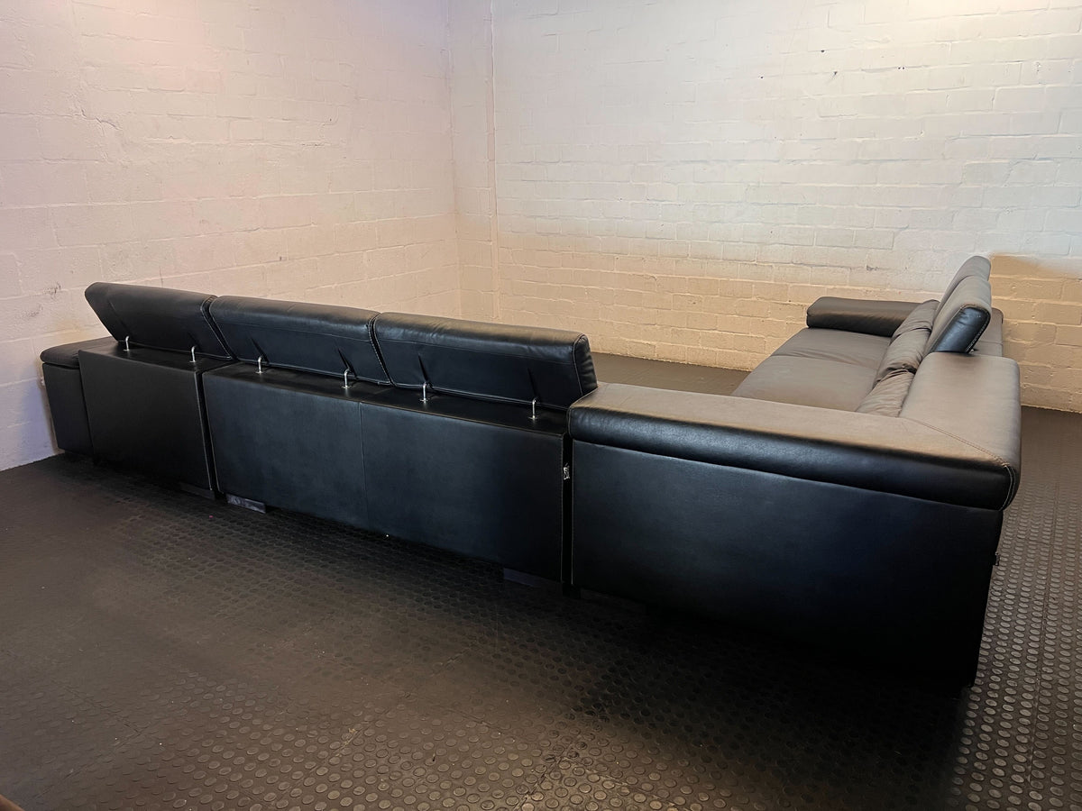 L shape lounge suite  - Spacious Black Leather Sectional Sofa - Some visible damages - 2ndhandwarehouse.com