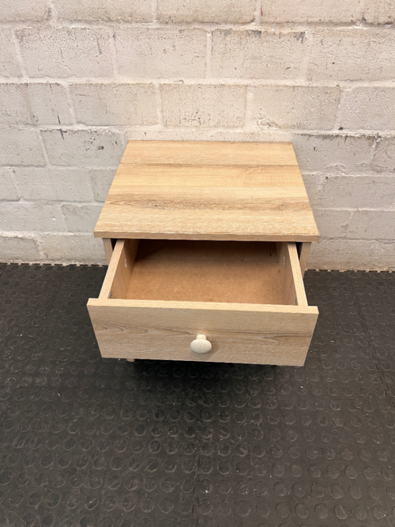 Light Wood-Look Bedside Table with Single Drawer — Used; Fair Condition