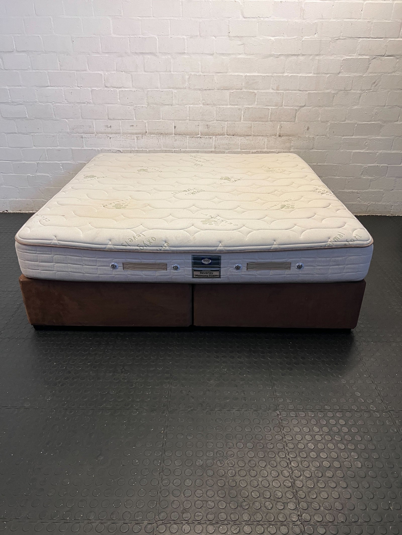 Modern Beige King Sized Bed with Brown Storage Base and Drawers