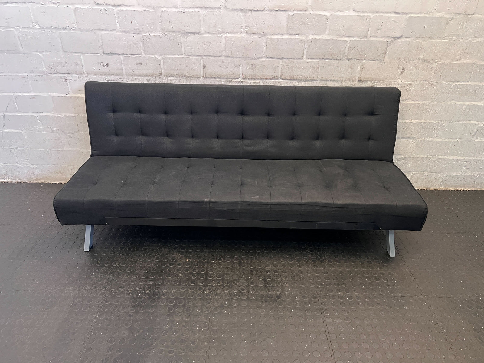 Modern Black Fabric Sofa Bed with Minor Wear - Stylish & Versatile