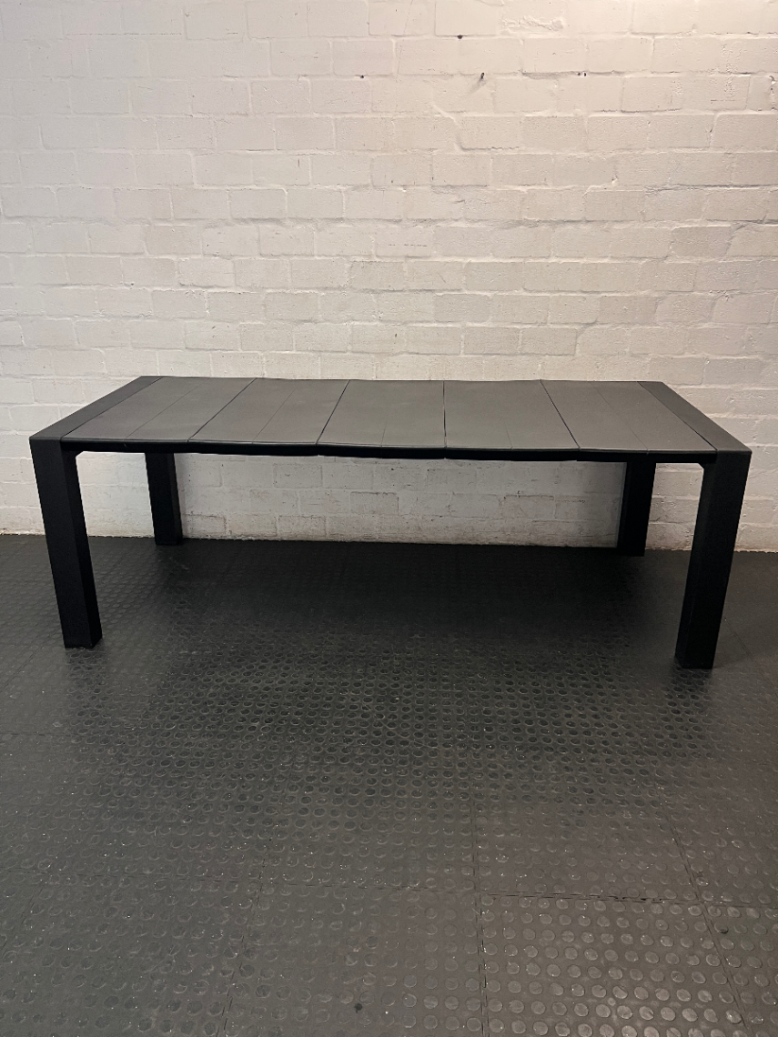 Modern Black Slat-Top Outdoor Table — Weather Exposure and General Wear - 2ndhandwarehouse.com
