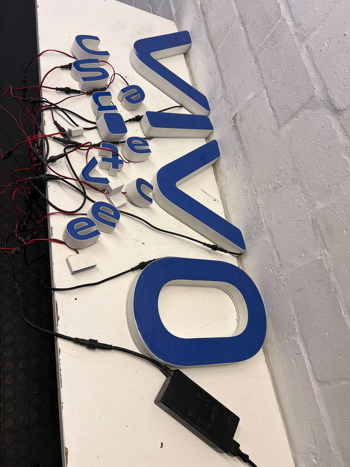 Modern Blue Neon Sign – VIVO – Wall Decor with Minor Wear