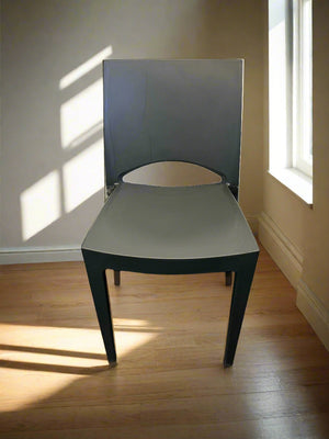 Modern Dark Grey Plastic Dining Chair with Minor Scratches