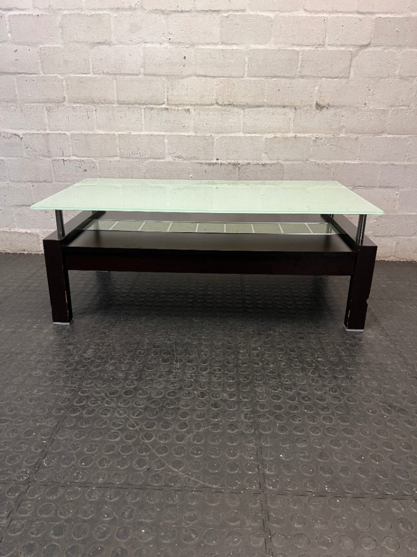 Modern Two-Tier Glass and Black Coffee Table — Well Used with Visible Wear