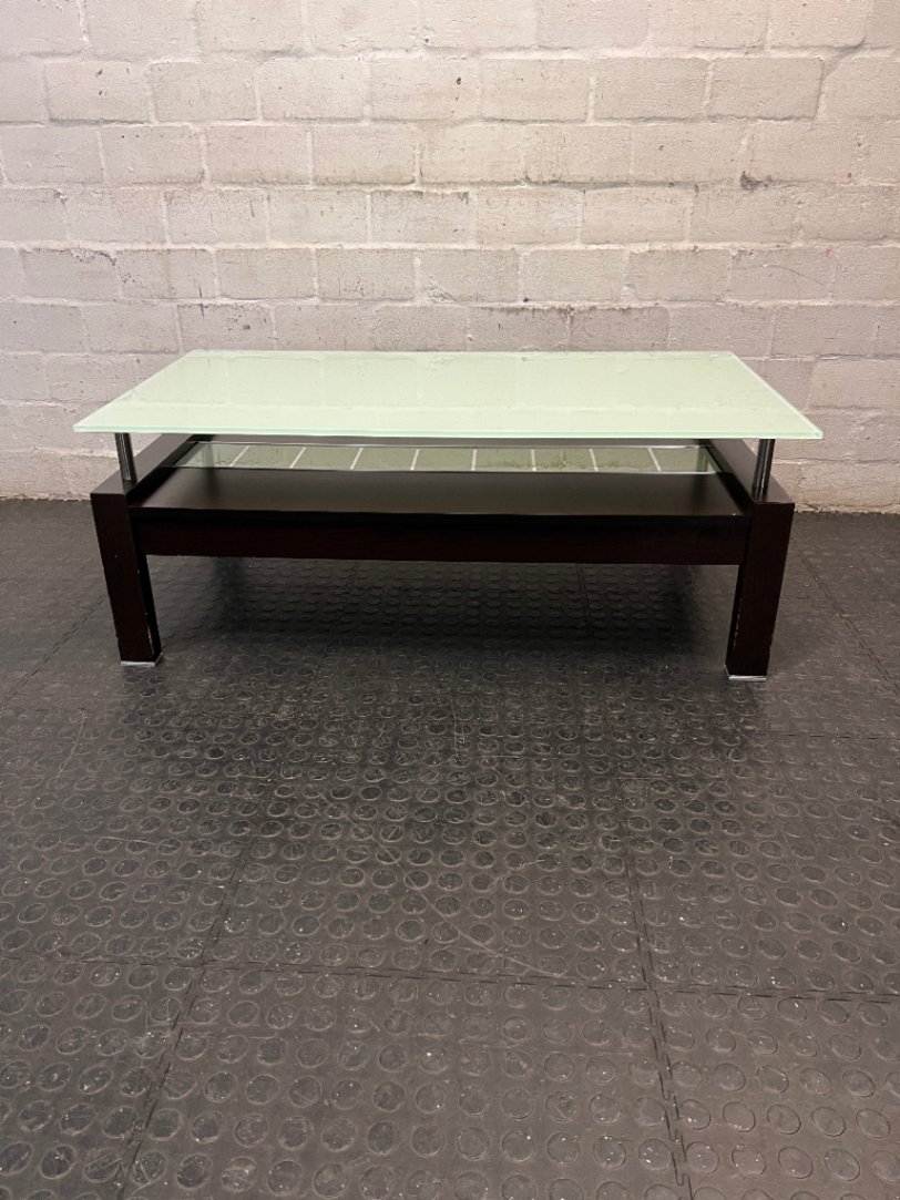 Modern Two-Tier Glass and Black Coffee Table — Well Used with Visible Wear
