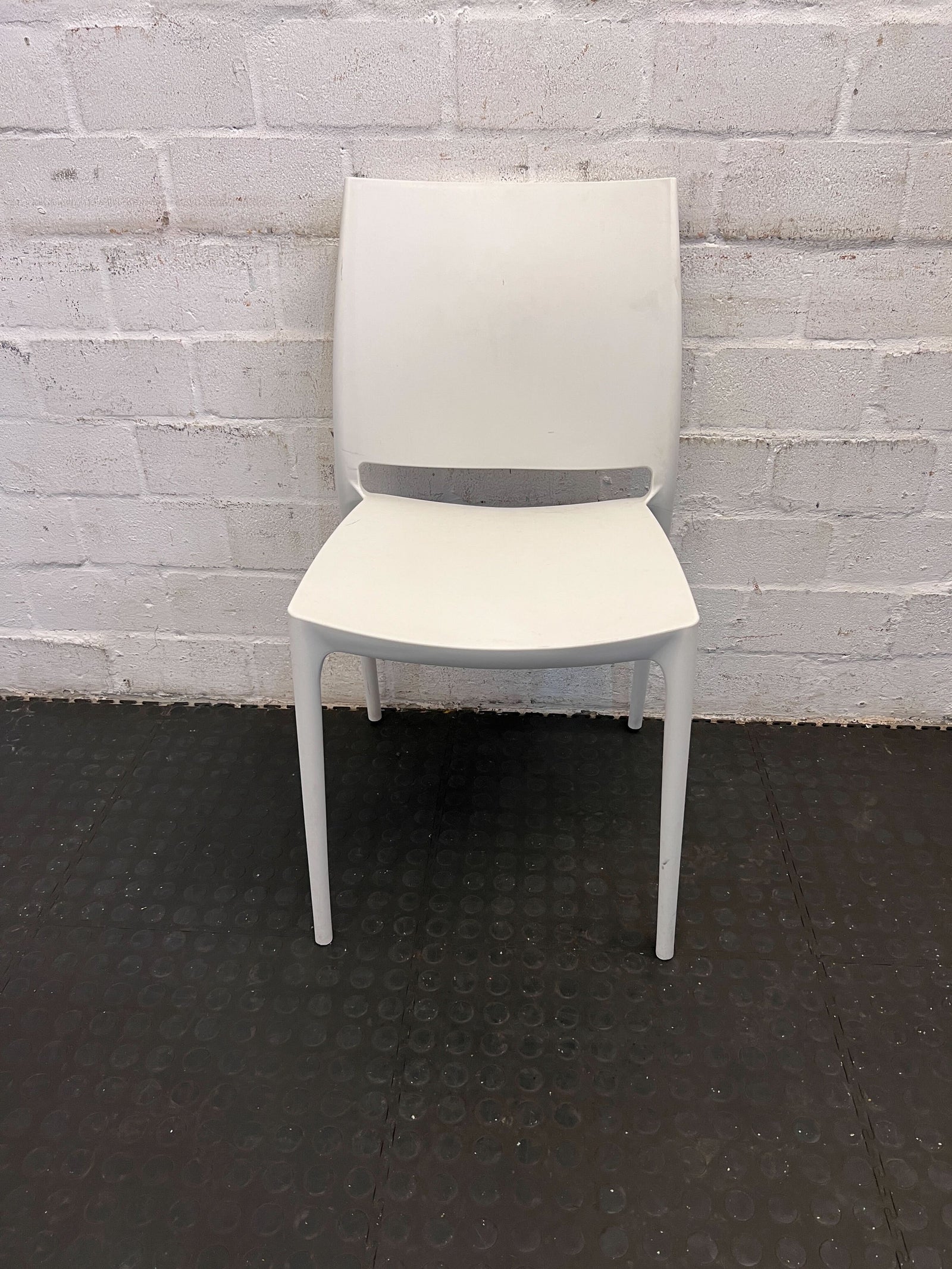 Modern White Plastic Dining Chair - Lightweight, Stackable, Versatile