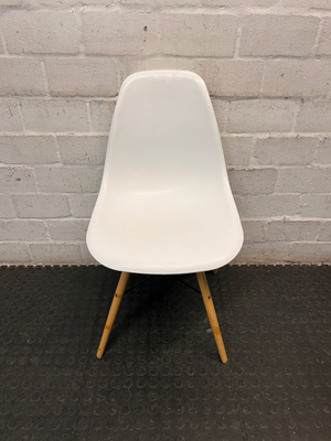 Moulded White Dining Chair with Wooden Legs — Visible Wear and Fair Condition