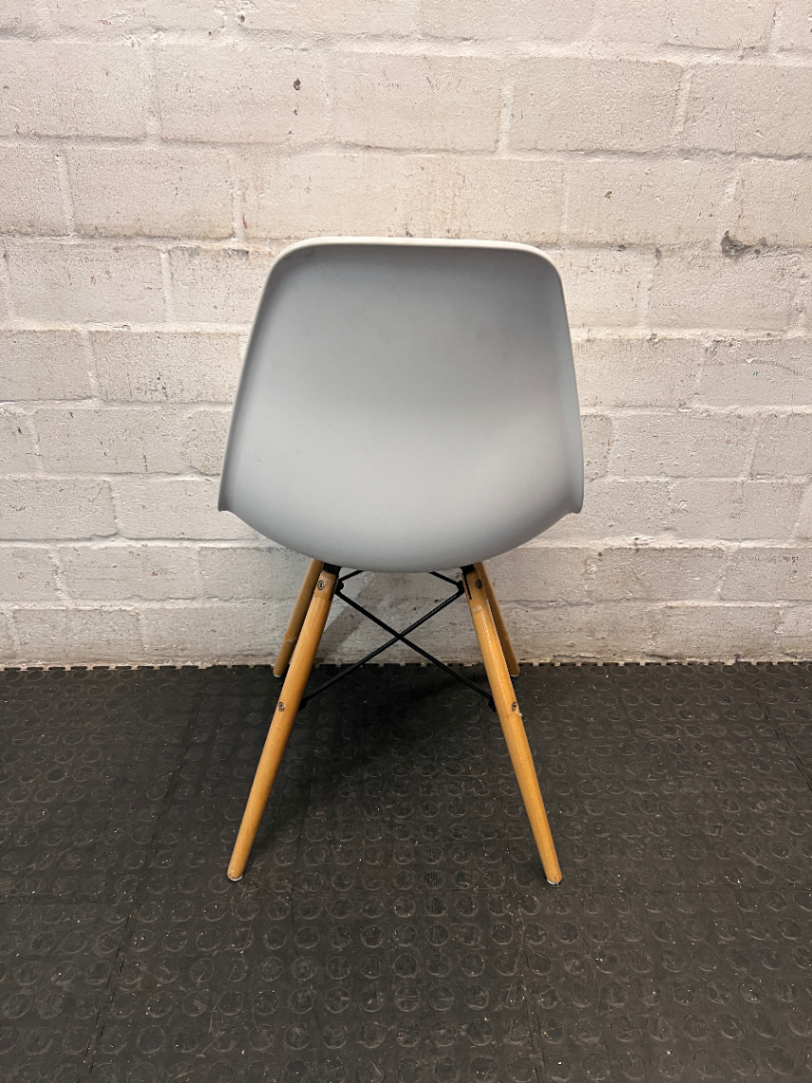 Moulded White Dining Chair with Wooden Legs — Visible Wear and Fair Condition