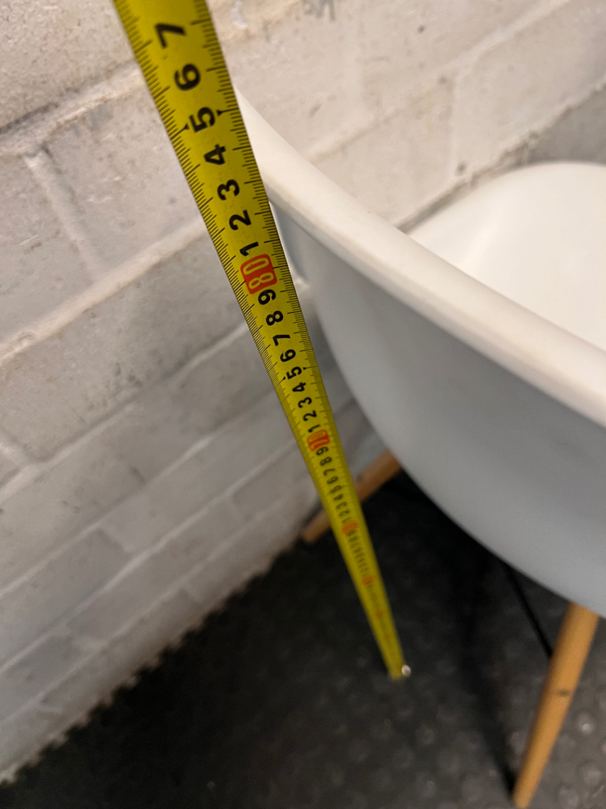 Moulded White Dining Chair with Wooden Legs — Visible Wear and Fair Condition