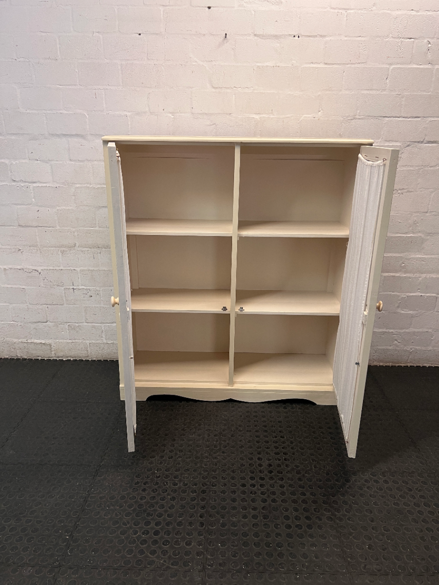 Off-White Wooden Storage Cupboard with Glass Inlay Doors — Fair Condition with Visible Wear