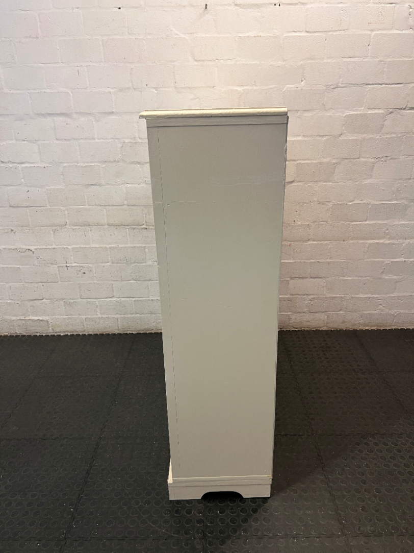 Off-White Wooden Storage Cupboard with Glass Inlay Doors — Fair Condition with Visible Wear