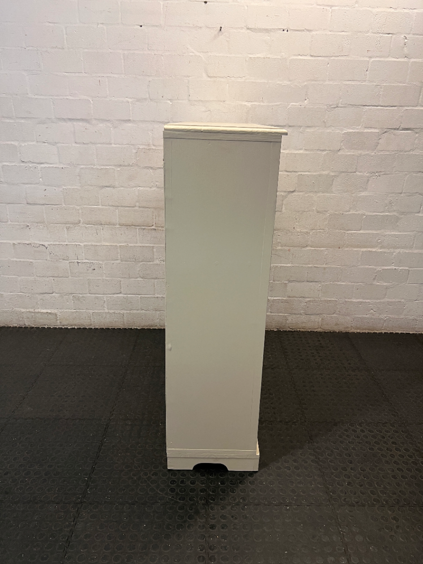 Off-White Wooden Storage Cupboard with Glass Inlay Doors — Fair Condition with Visible Wear