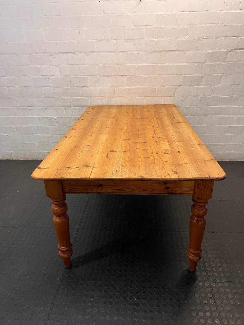 Oregon Pine 8-Seater Dining Table with Turned Legs — Good Used Condition - 2ndhandwarehouse.com