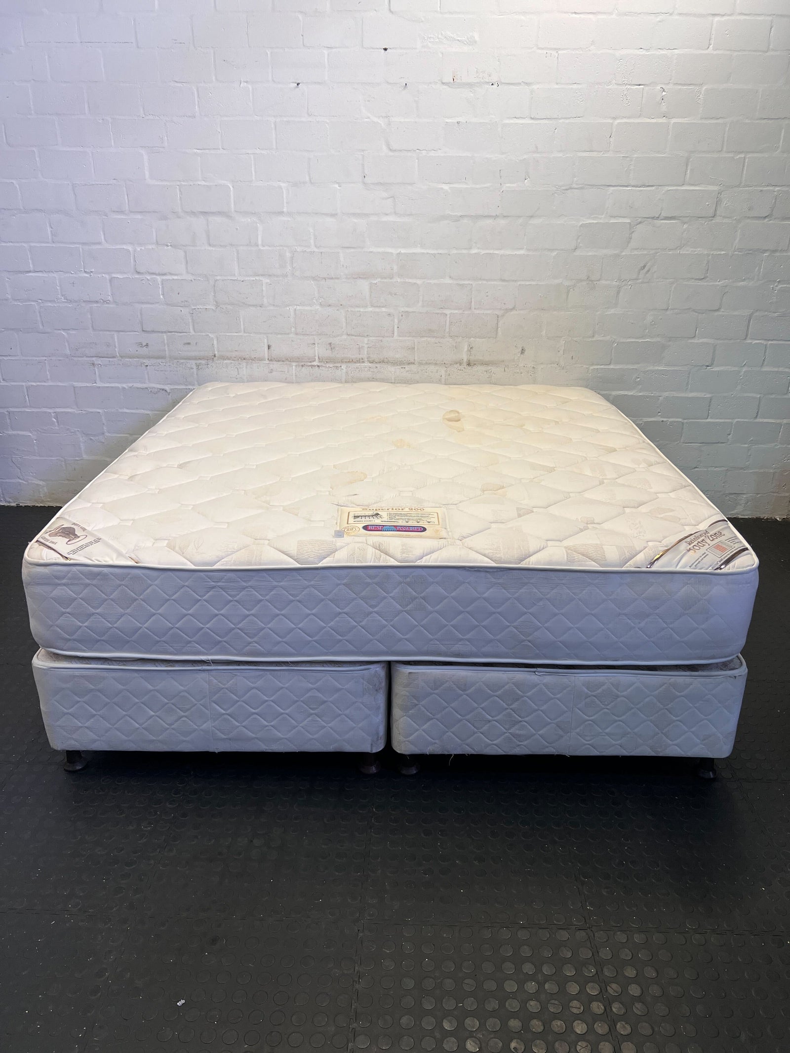 Plush White King Bed Mattress with Minor Stains