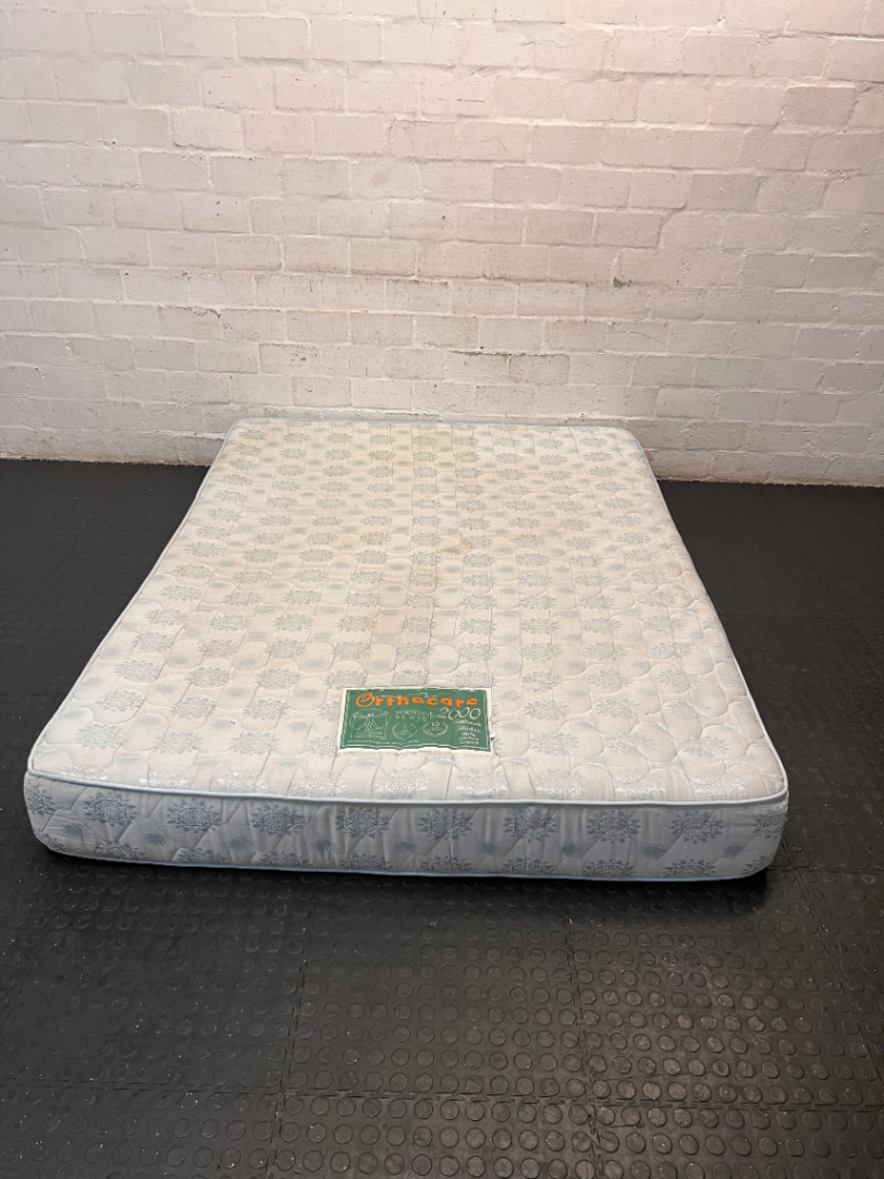 Queen Size Orthacare Patterned Mattress — Visible Staining on Surface - 2ndhandwarehouse.com