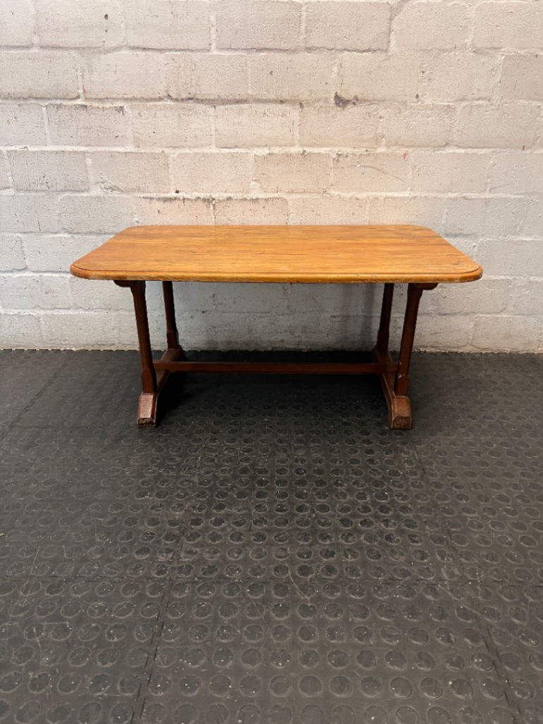 Rectangular Wooden Trestle Coffee Table — Heavy Surface Scratches and Worn Varnish