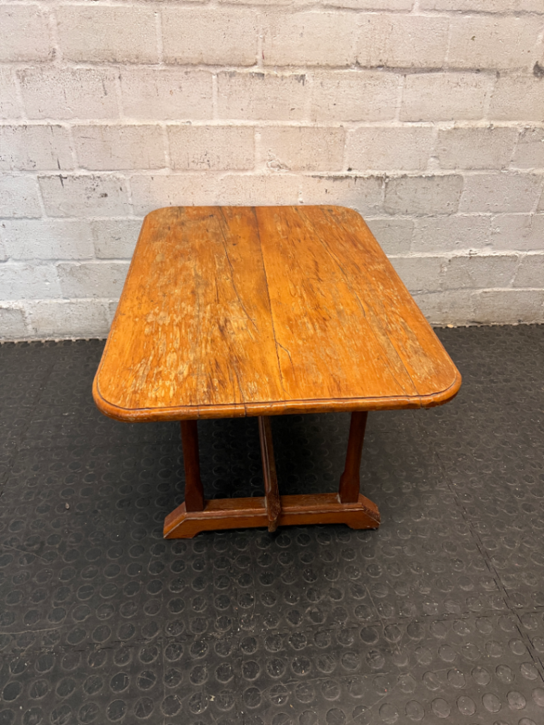 Rectangular Wooden Trestle Coffee Table — Heavy Surface Scratches and Worn Varnish