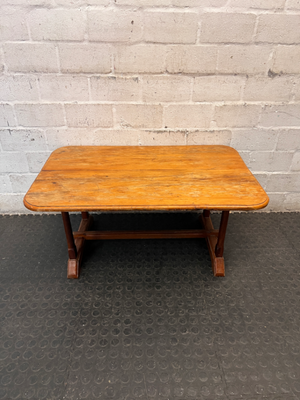 Rectangular Wooden Trestle Coffee Table — Heavy Surface Scratches and Worn Varnish