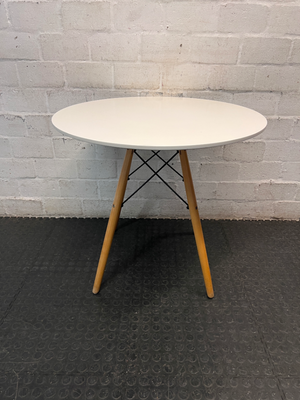 Round White Dining Table with Timber Eiffel Legs — Small Marks on Surface