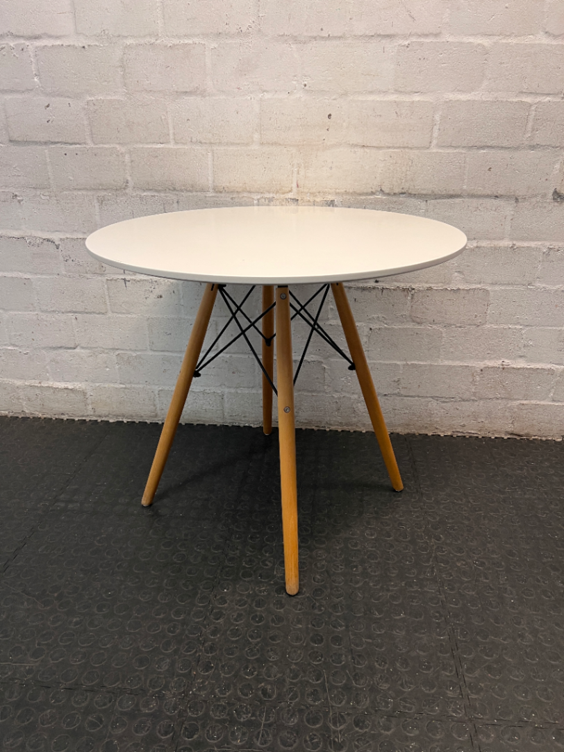 Round White Dining Table with Timber Eiffel Legs — Small Marks on Surface