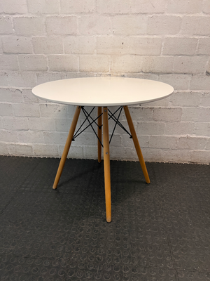 Round White Dining Table with Timber Eiffel Legs — Small Marks on Surface