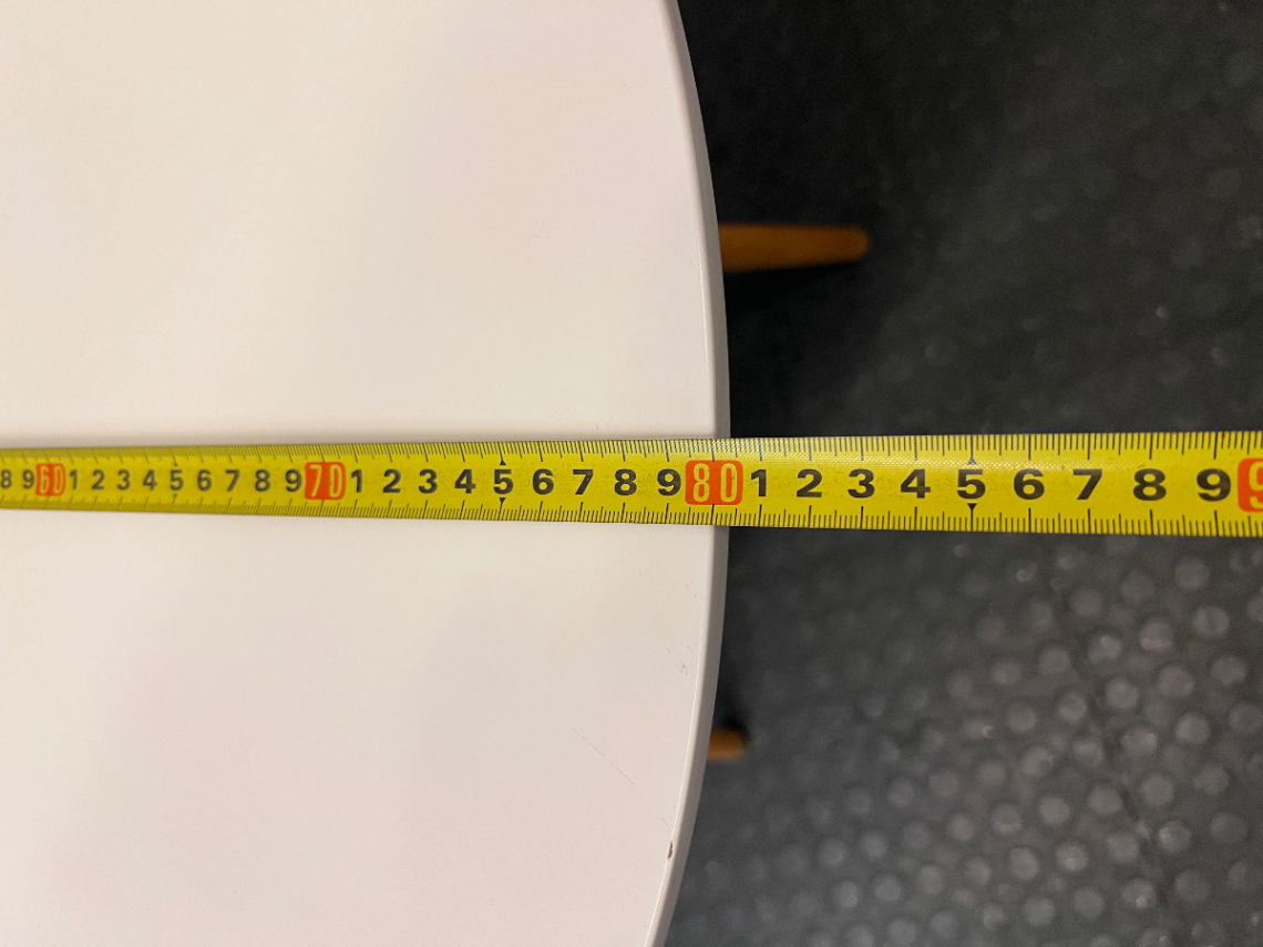 Round White Dining Table with Timber Eiffel Legs — Small Marks on Surface