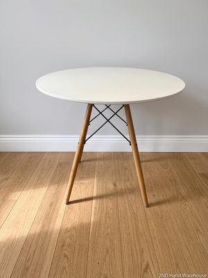 Round White Table with Eiffel-Style Wooden Legs
