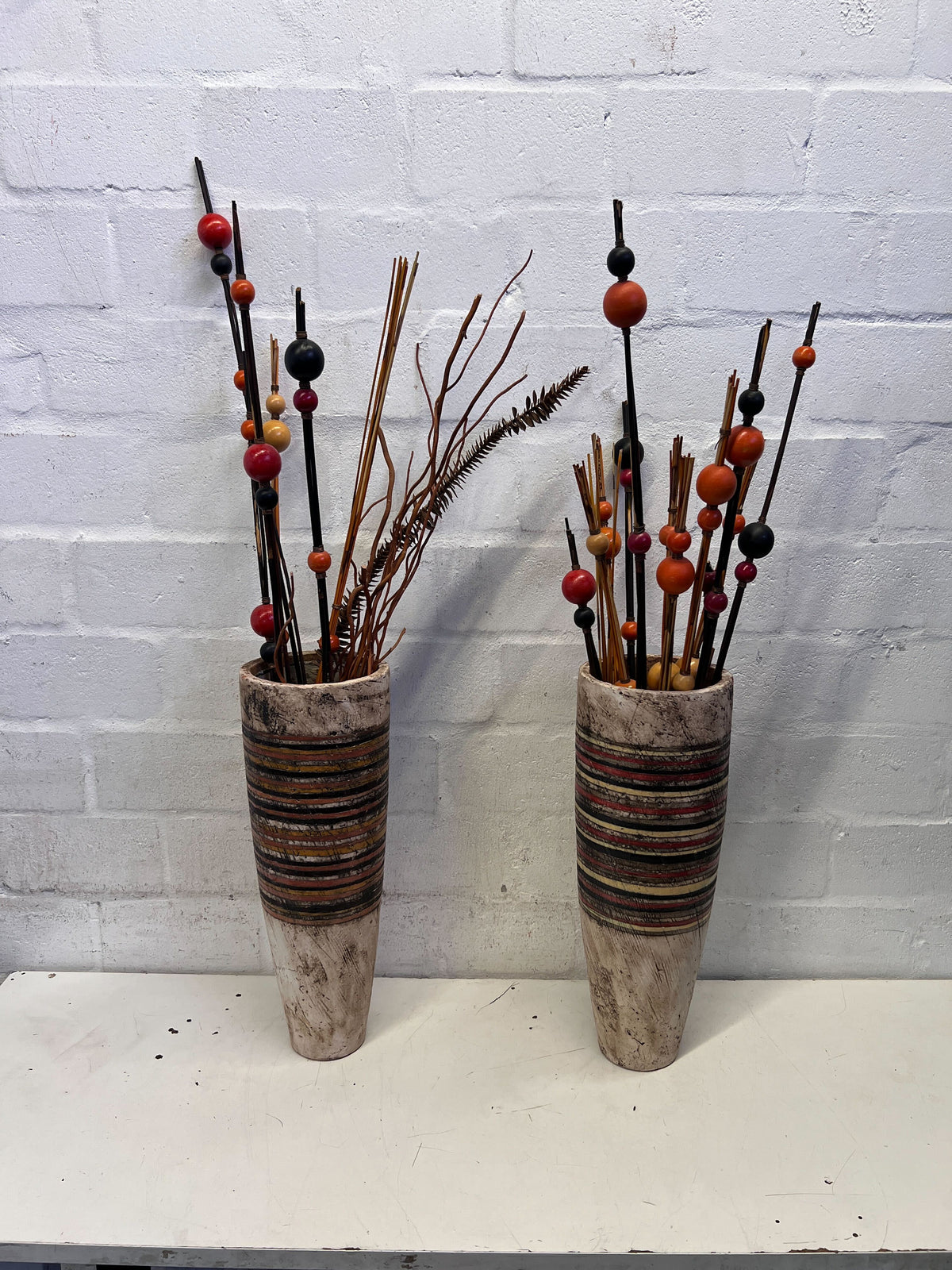Rustic Striped Vase with Beaded Decorative Sticks