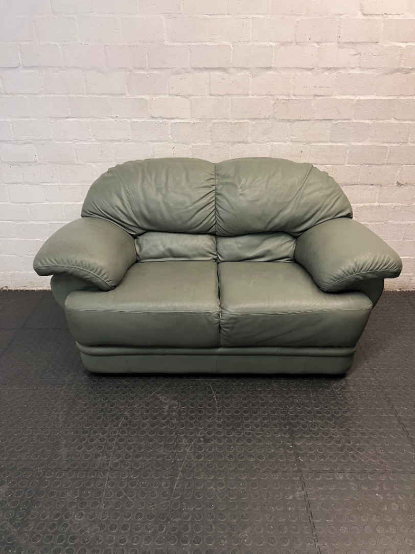 Sage Green Leather 2 Seater Couch — Small Tear on One Seat Section