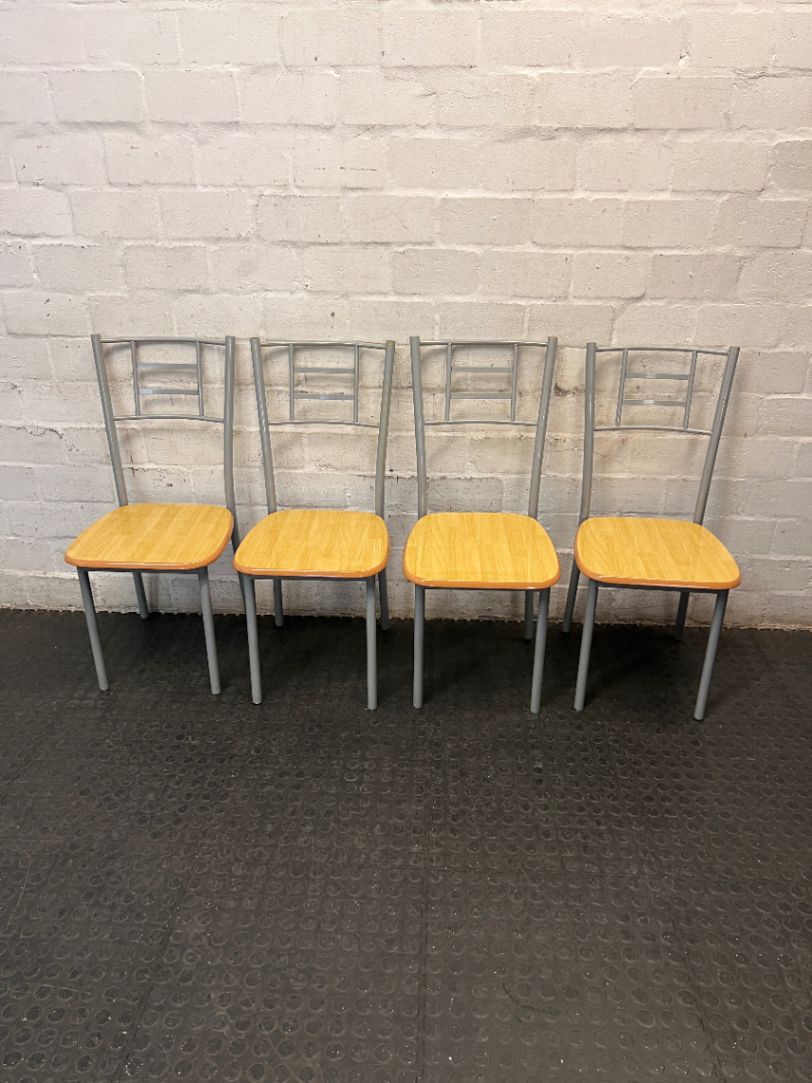 Silver Metal Dining Chair with Wood-Effect Seat — Visible Surface Wear and Scuffing