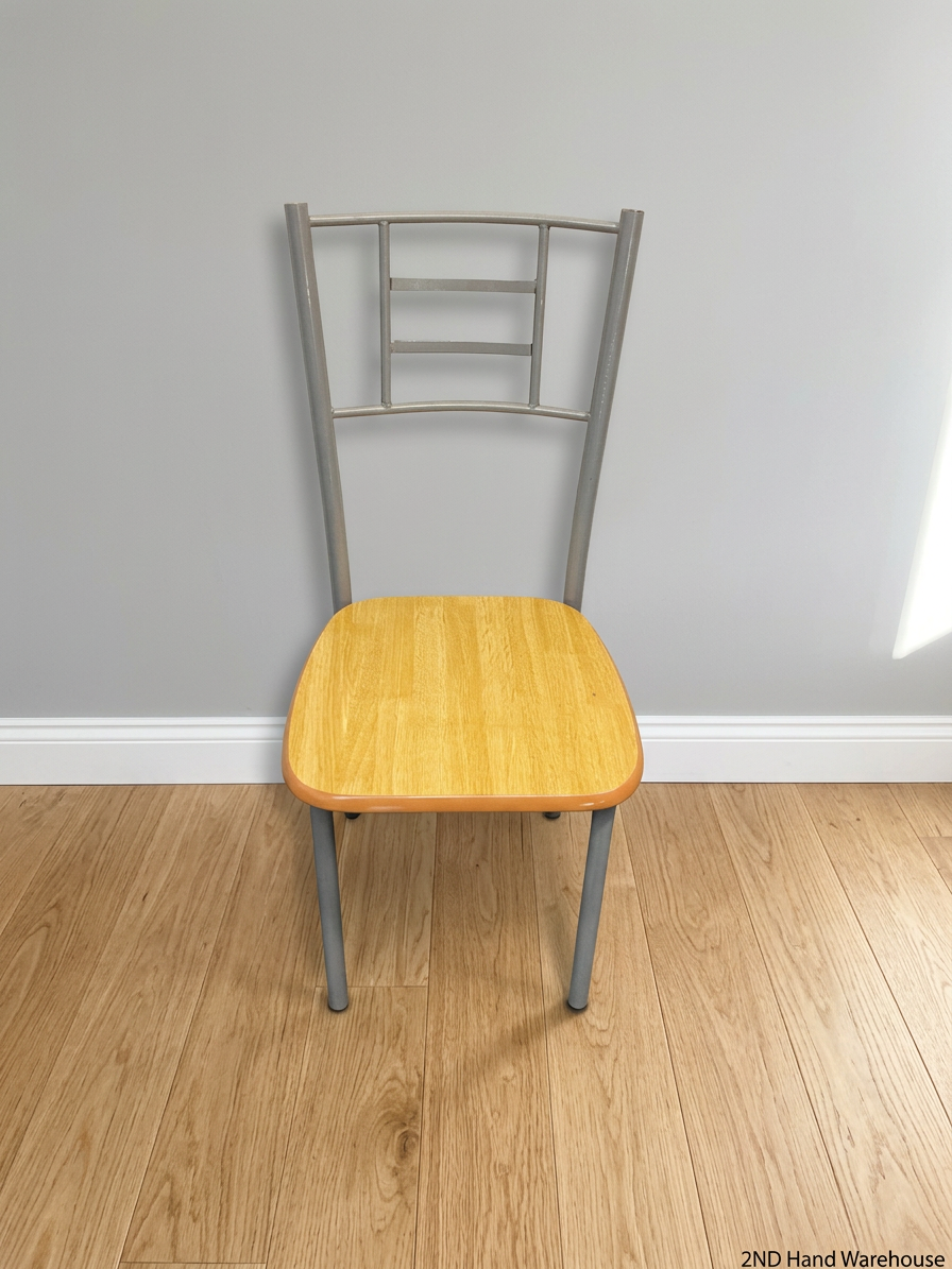 Silver Metal Dining Chair with Wood-Effect Seat — Visible Surface Wear and Scuffing