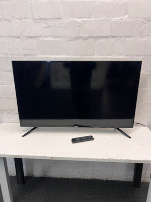 Sleek Black Flat Screen LED Television with Stand — Working Well; Heavily Used Condition