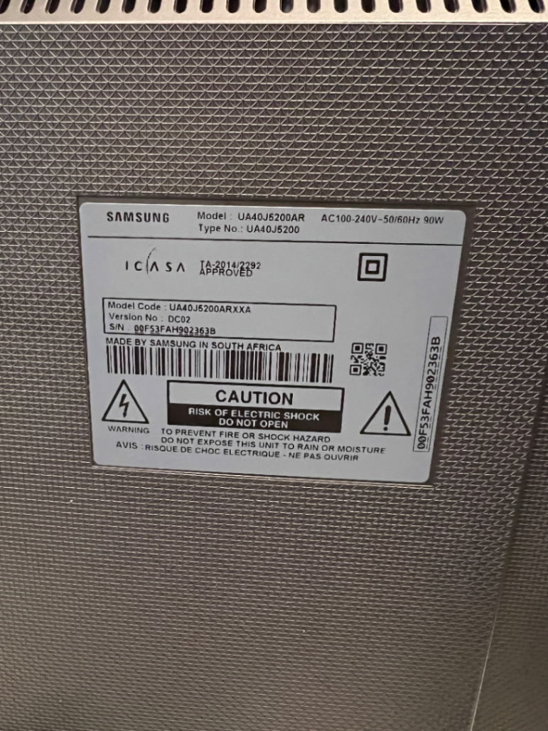 Sleek Black Flat Screen LED Television with Stand — Working Well; Heavily Used Condition