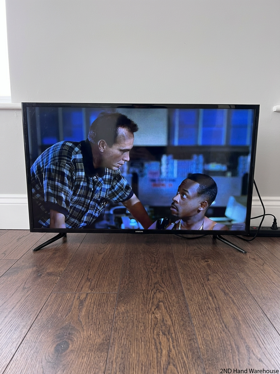 Sleek Black Flat Screen LED Television with Stand — Working Well; Heavily Used Condition