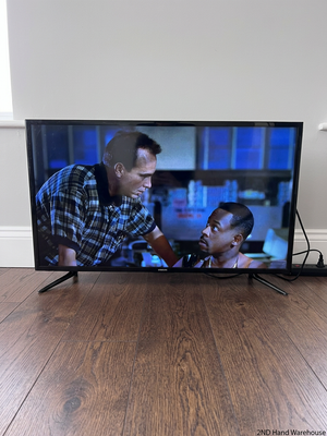 Sleek Black Flat Screen LED Television with Stand — Working Well; Heavily Used Condition