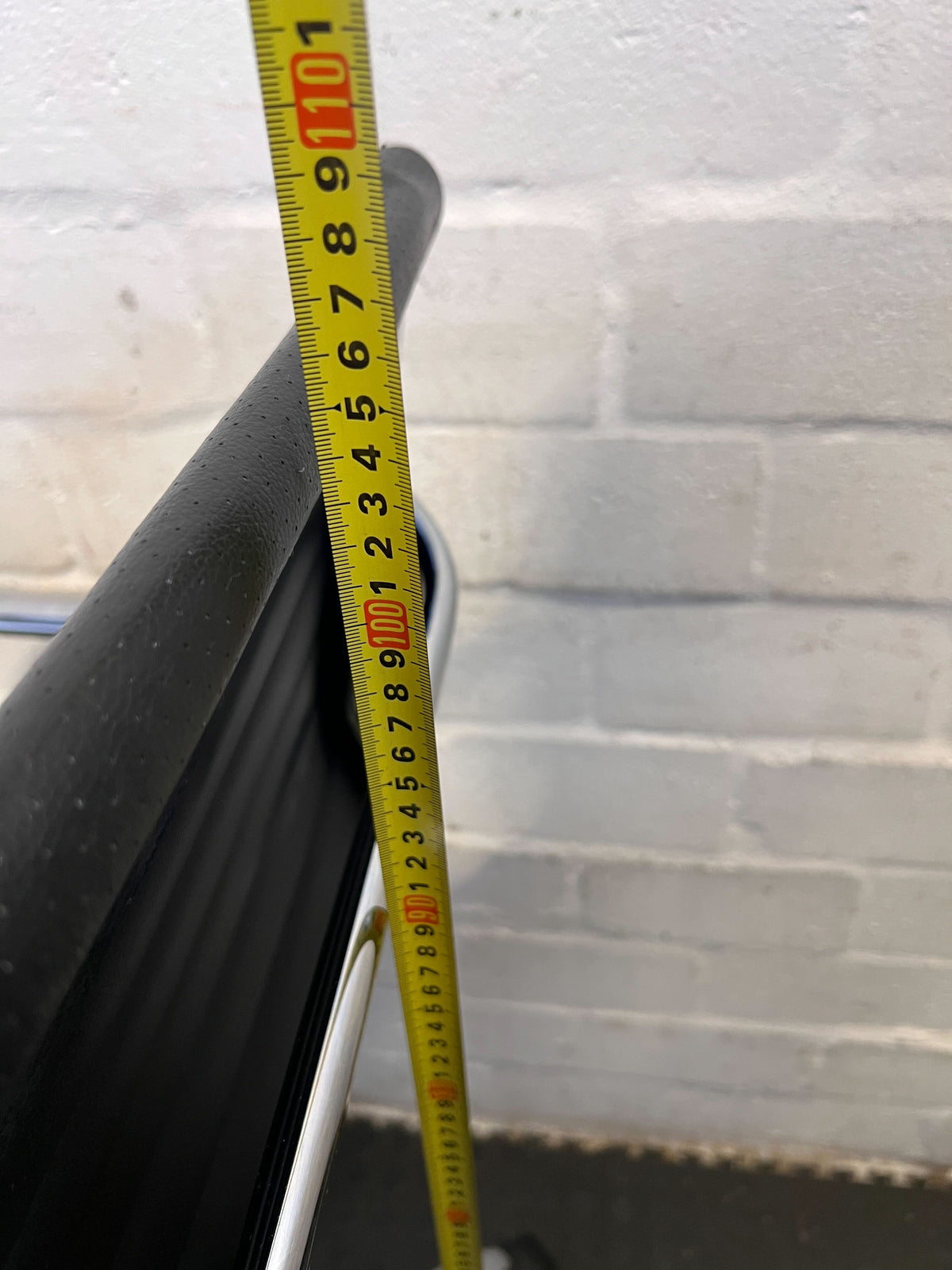 Sleek Black Office Chair with Chrome Accents – Minor Wear