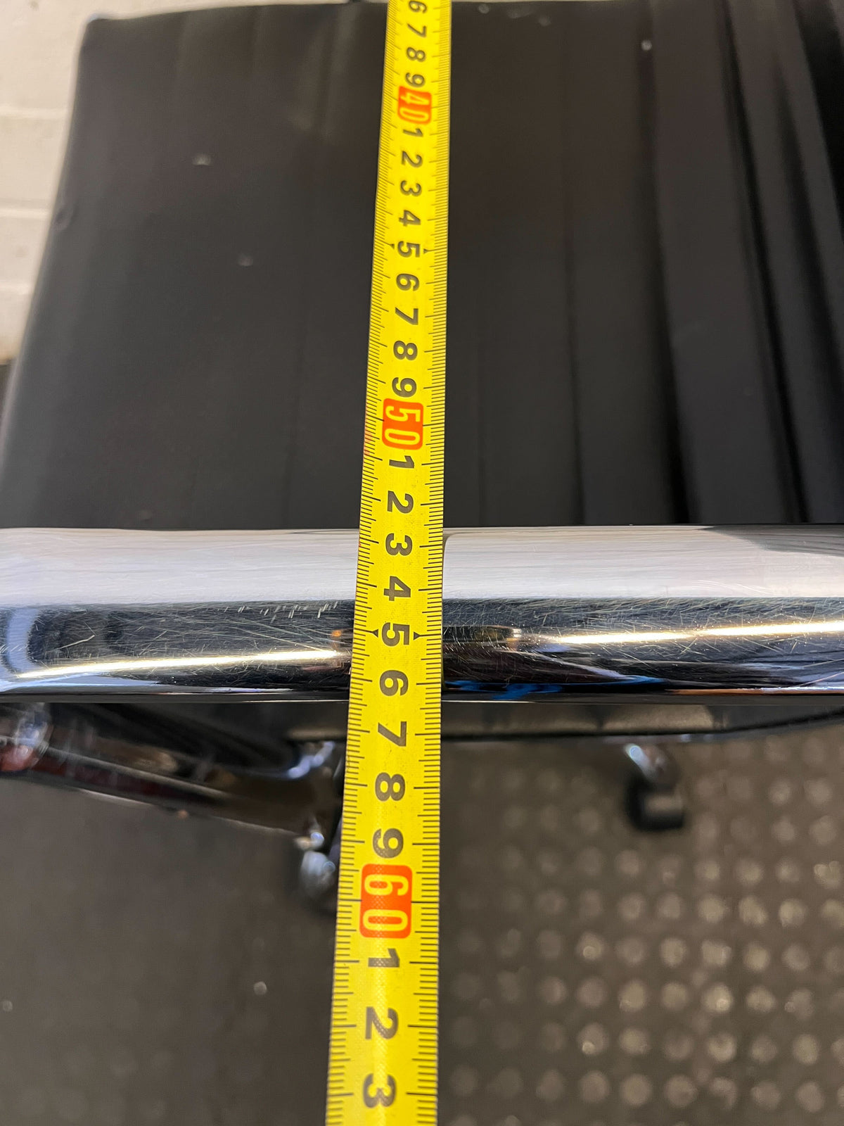 Sleek Black Office Chair with Chrome Accents – Minor Wear