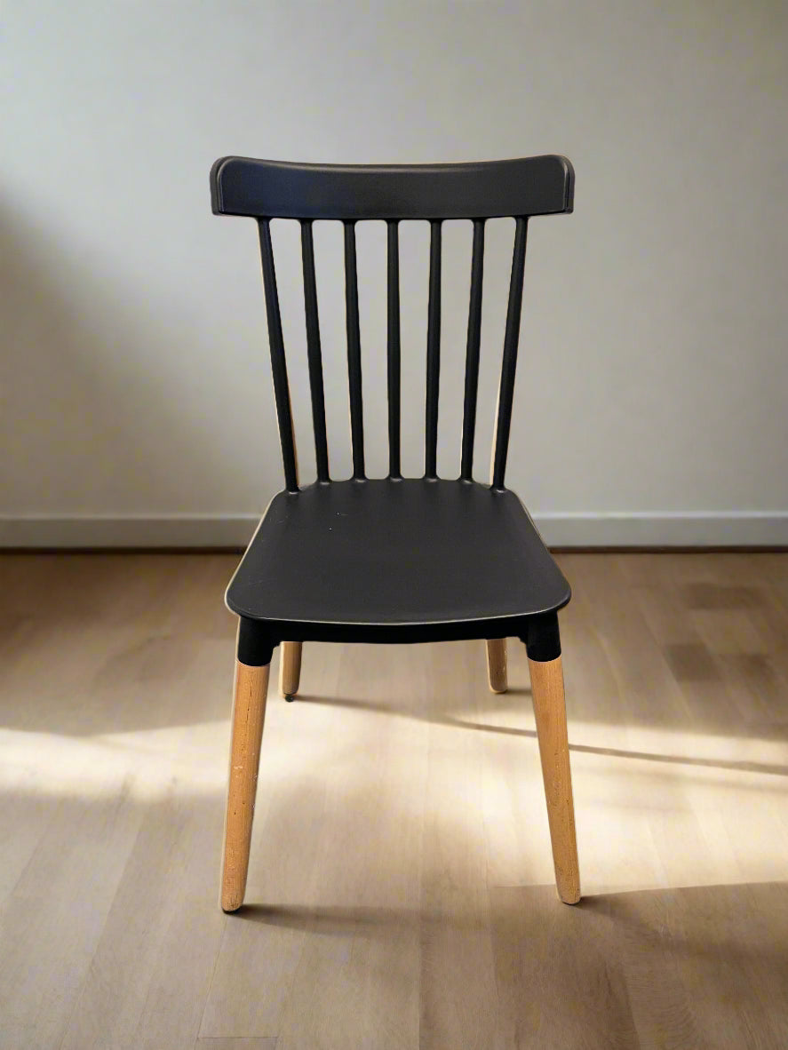Sleek Black Wooden Dining Chair with Natural Legs – Minimal Wear