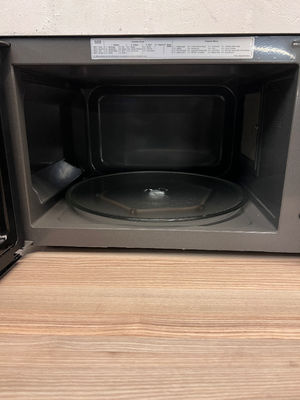 Sleek LG Black Smart Inverter Microwave - 2ndhandwarehouse.com