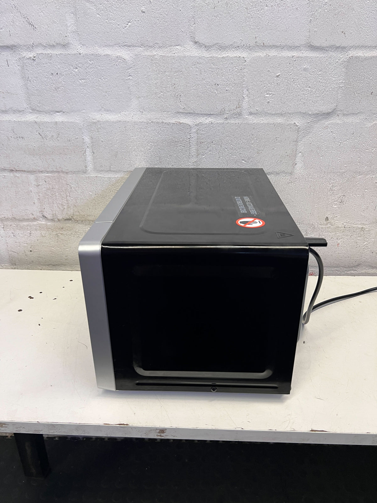 Sleek Silver Microwave Oven - Modern Kitchen Essential