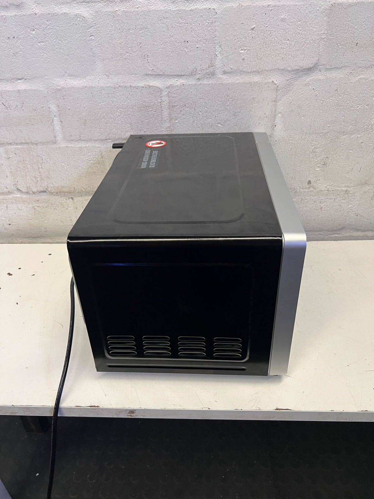 Sleek Silver Microwave Oven - Modern Kitchen Essential