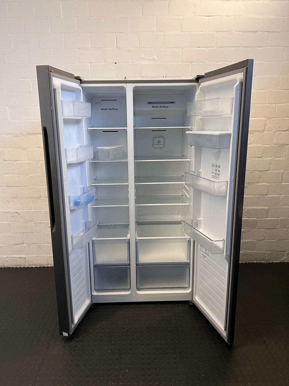 Spacious Grey Hisense Side-by-Side Fridge with Water Dispenser - REDUCED