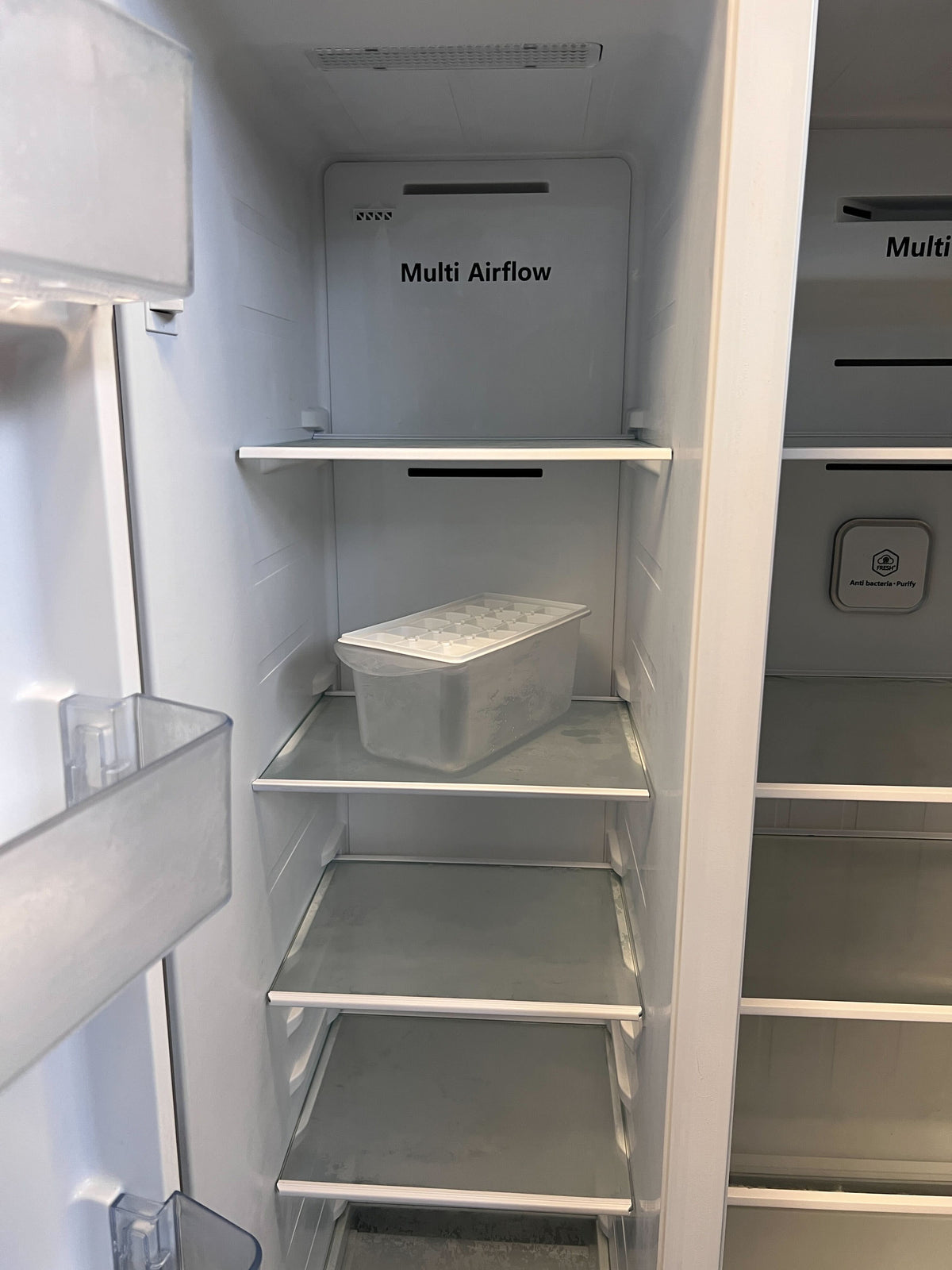 Spacious Grey Hisense Side-by-Side Fridge with Water Dispenser - REDUCED