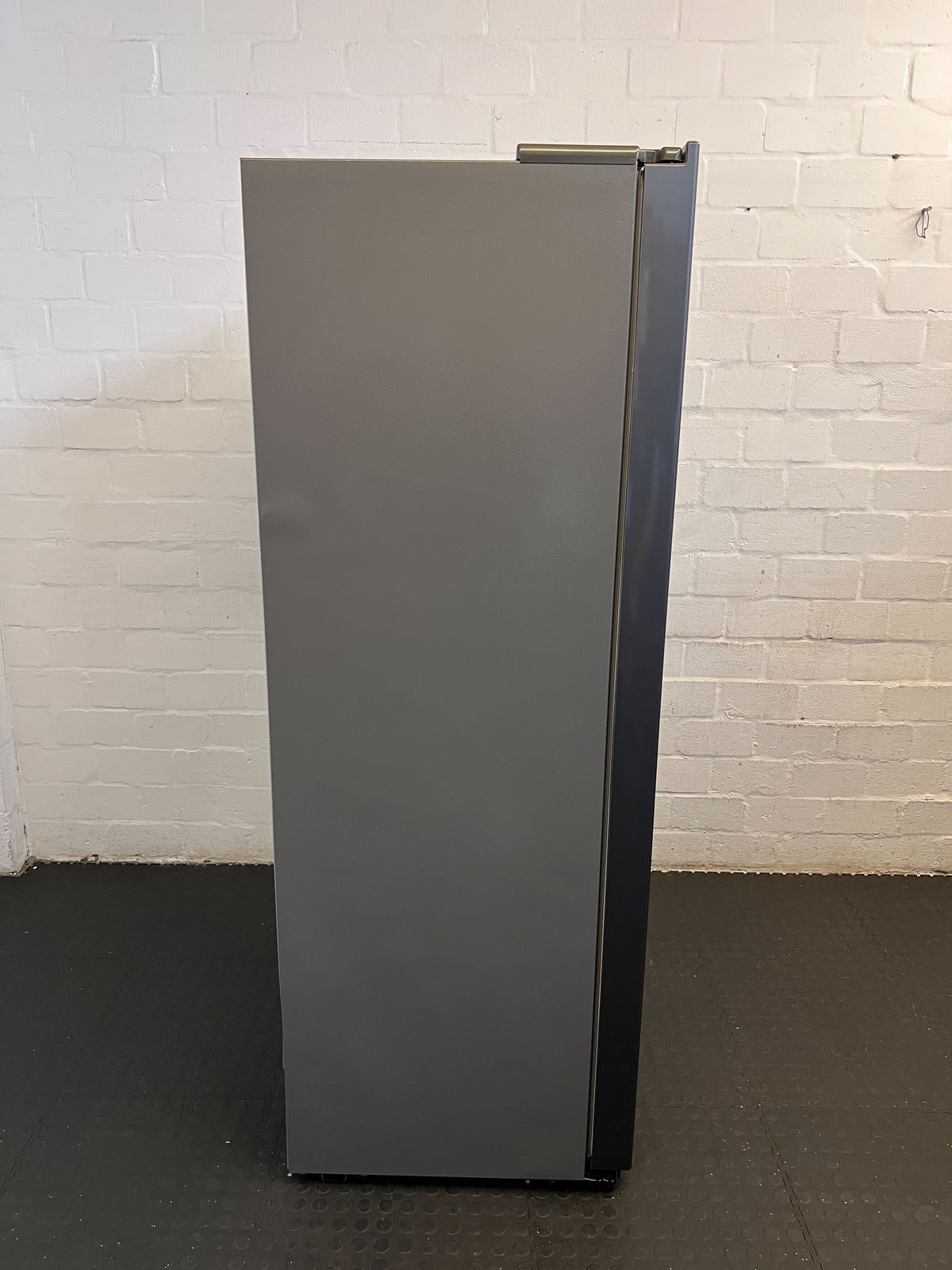 Spacious Grey Hisense Side-by-Side Fridge with Water Dispenser - REDUCED