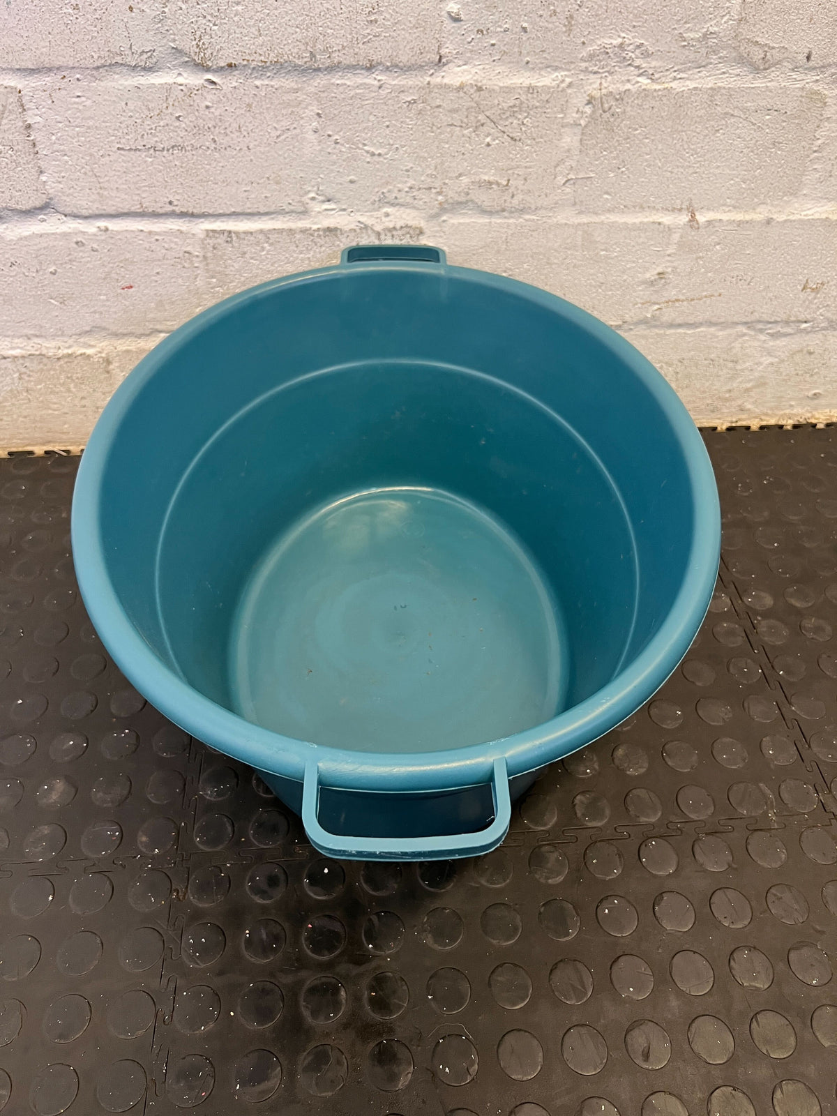 Spacious Turquoise Plastic Utility Tub with Minor Scratches