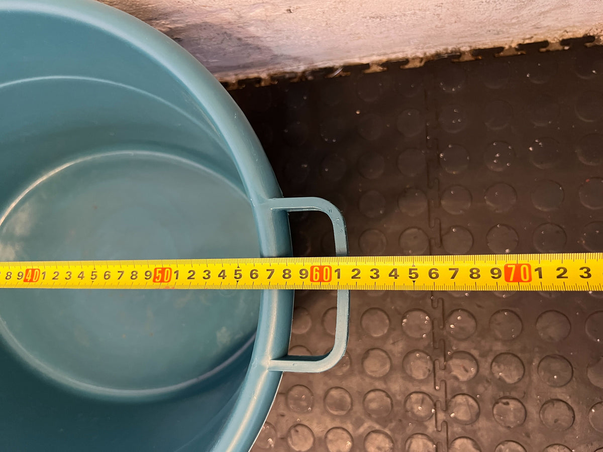 Spacious Turquoise Plastic Utility Tub with Minor Scratches